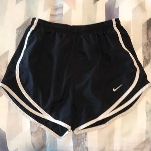 Black Nike running shorts